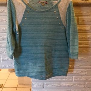 Blue and white top with silver design